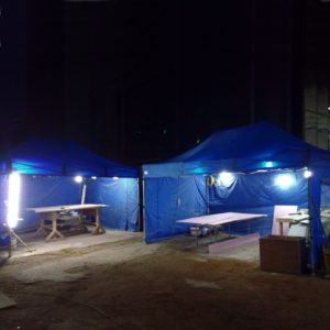 Multiple Gazebos in use at night