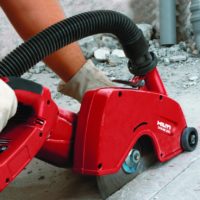 Hilti Diamond Cutter with dust extractor cutting on site