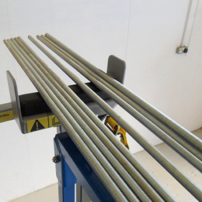 Deck Rail attached to Scissor Lift holding Studding