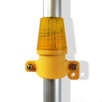 Side Mounted Amber Safety Light on hire attached to Scaffold Tube